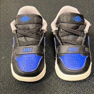 Nike Jordans Black and Blue Sneakers Low-Top Design